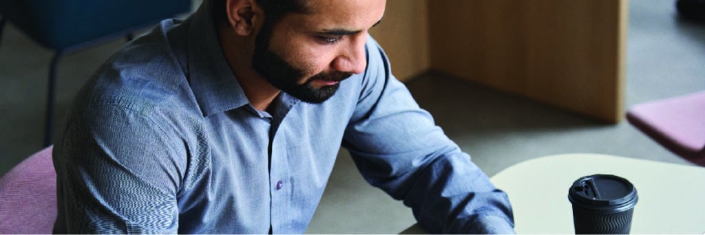 Business person looking at laptop