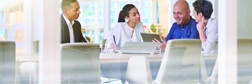 Business people sitting around a comference table