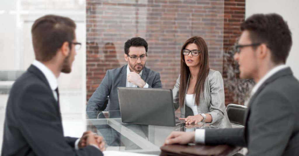 Professional Services Industry Professionals Collaborating Around a Table