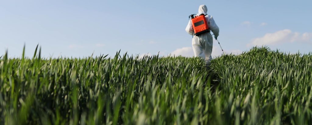 Veseris farmer spraying pesticides in the field
