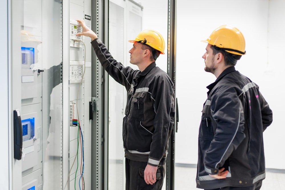 Field service technicians performing a job out in the field.