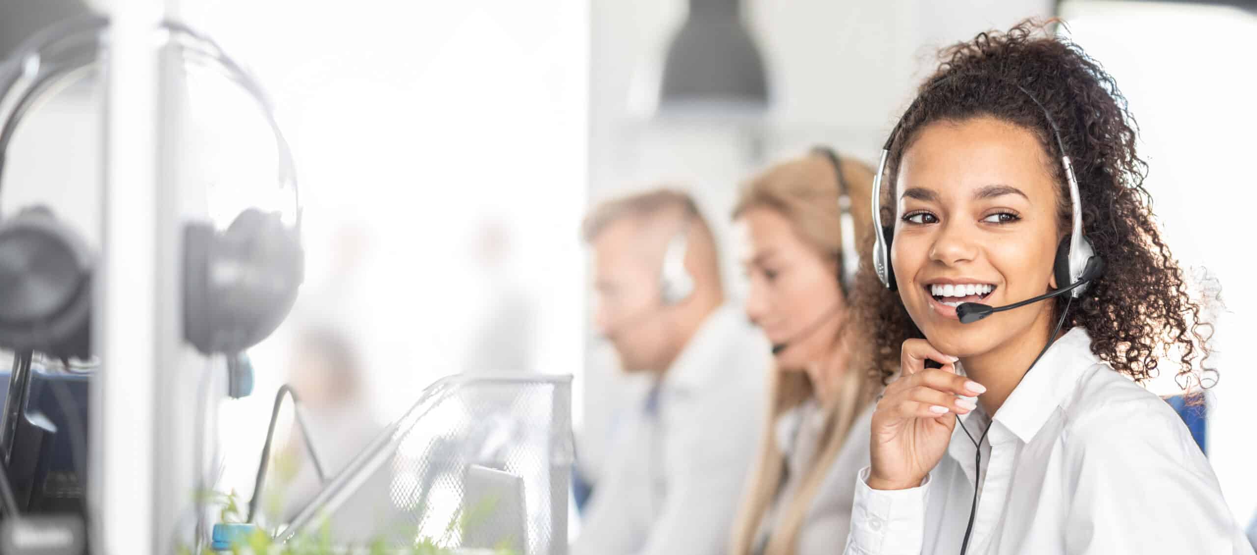 Call center worker accompanied by her team