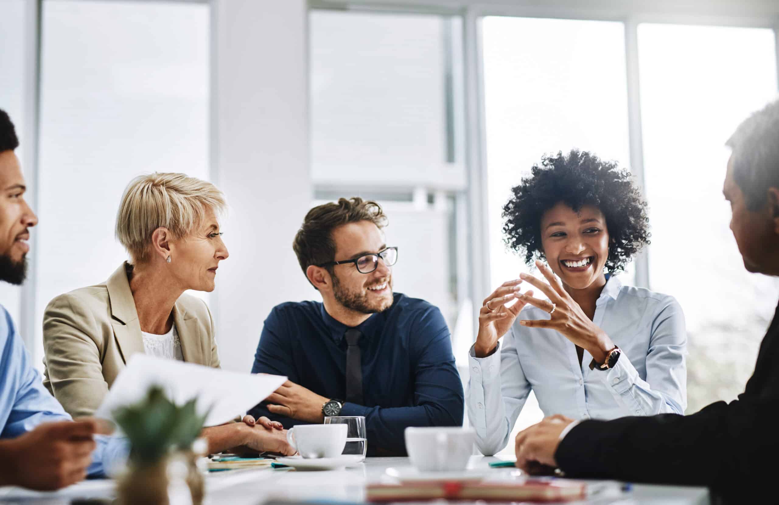 shot of a group of businesspeople sitting together in a meeting