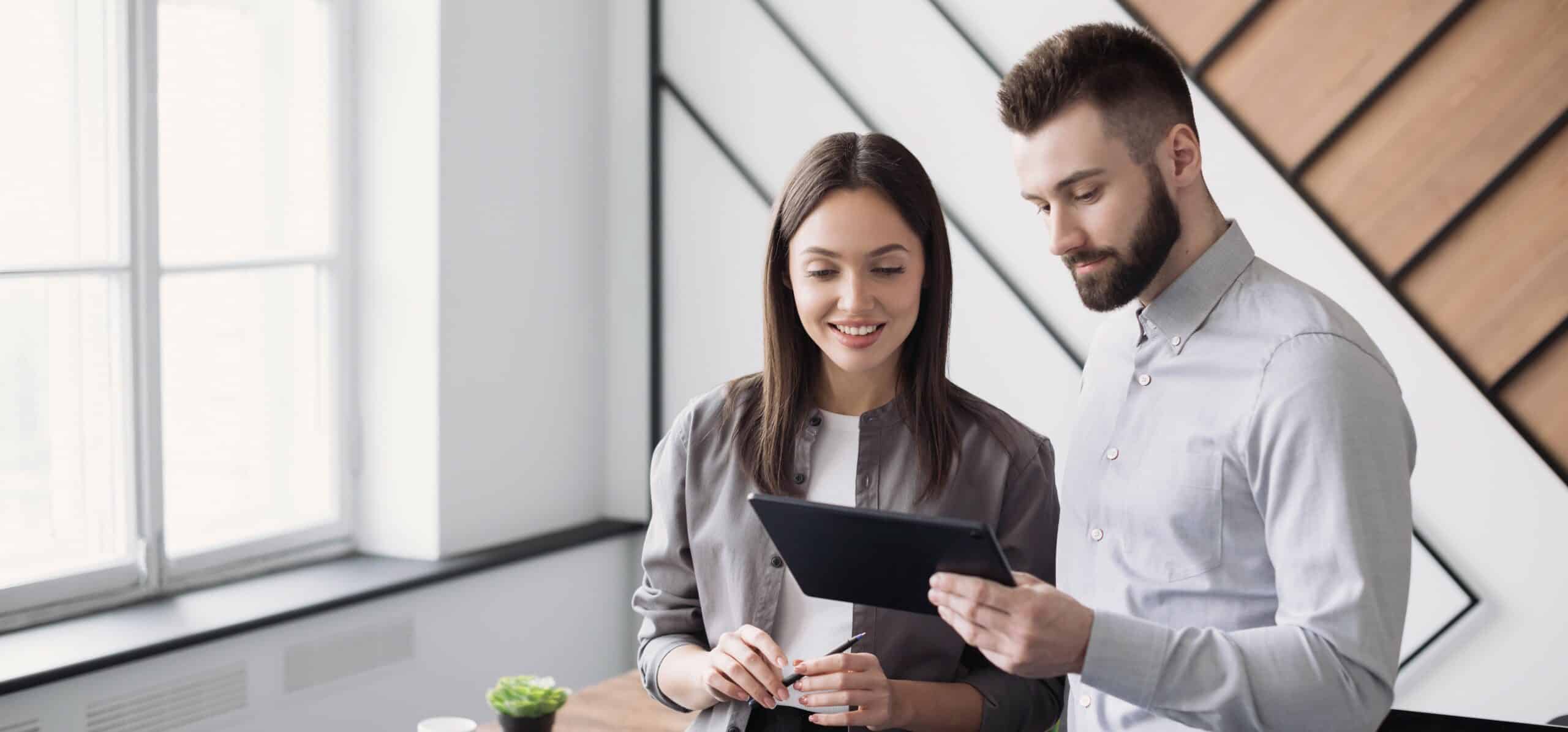 Young people professionals working in office with tablet