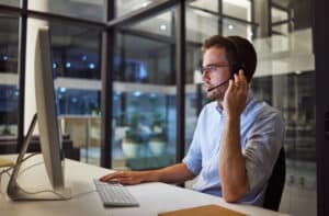businessman offering online support through headset- pitch marketing agency