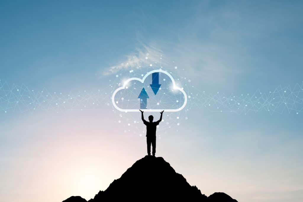 man holding up technology cloud