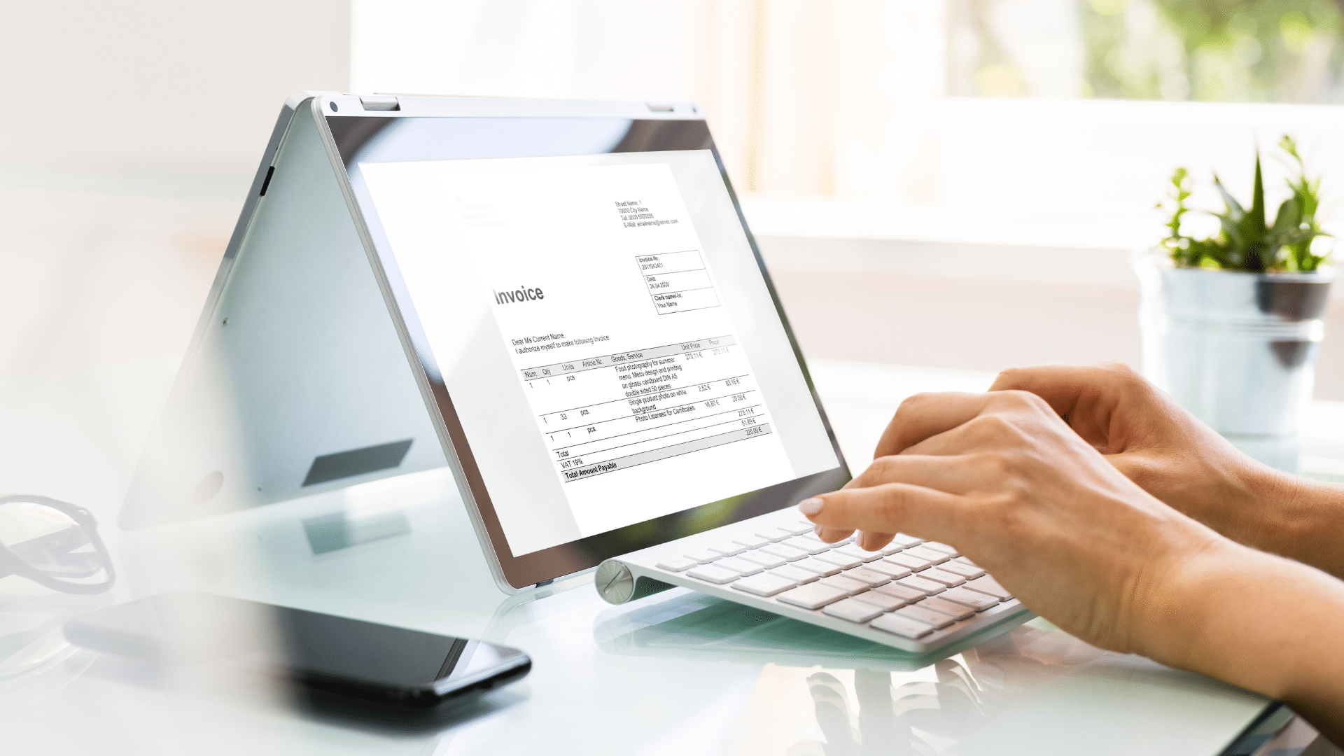 computer tablet with an invoice on the screen