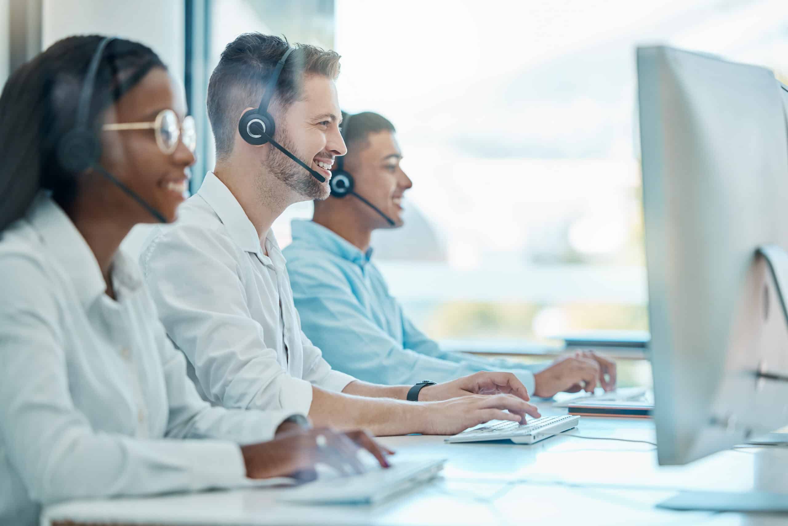 Call center team, telemarketing and computer consulting, crm contact us and customer support, service and advice. Happy salesman working with consultant group on desktop, communication and web help.