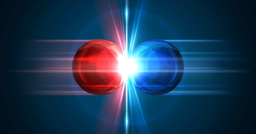 Two balls of energy colliding and producing a bright light