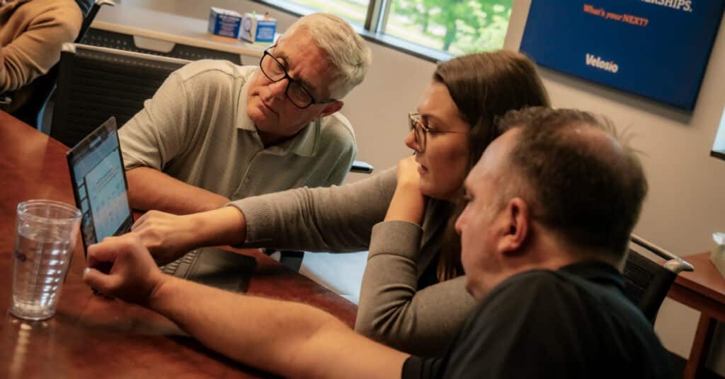Velosi Employees Collaborating