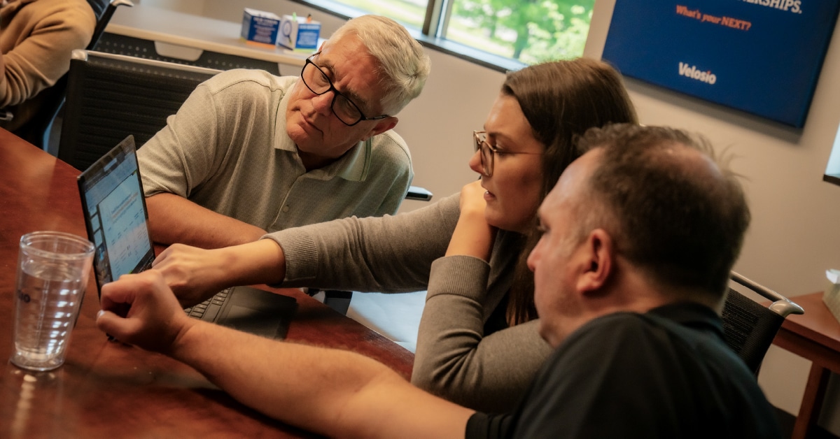 Velosi Employees Collaborating